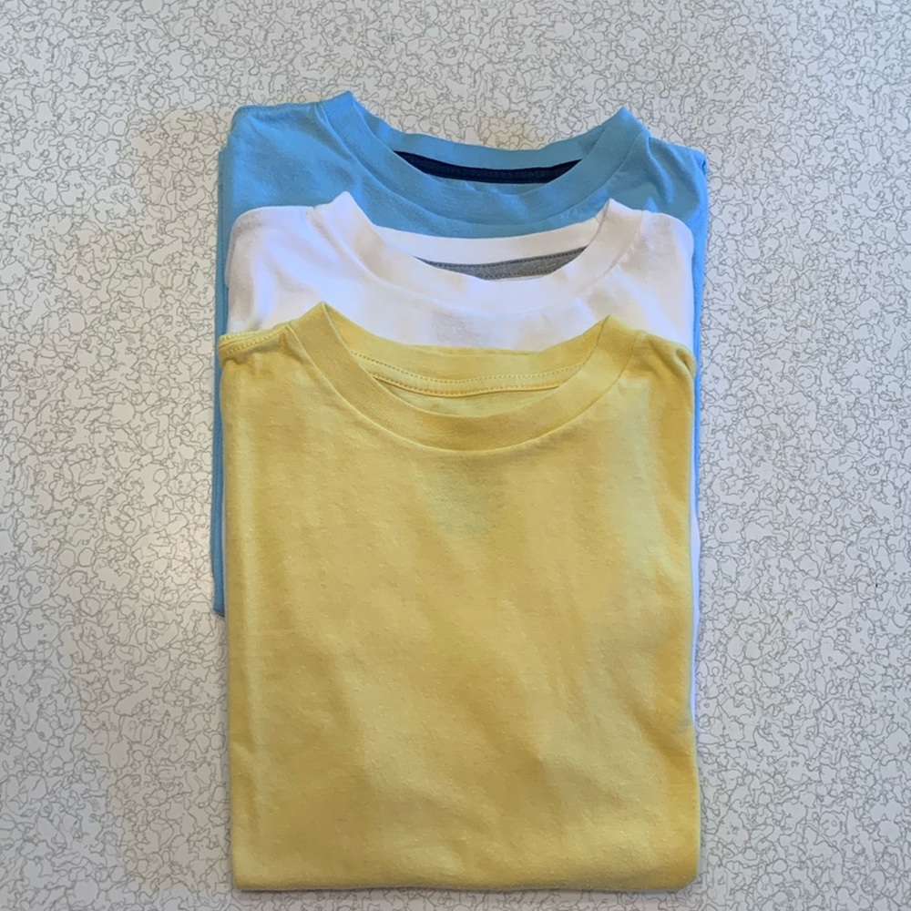 JCPenney boys Spring t-shirts. 3 for $13. Blue, yellow and, white.